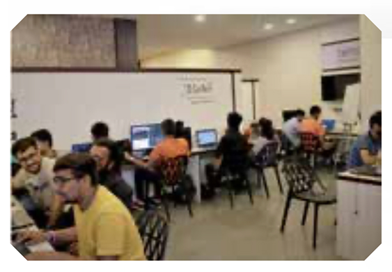 Founder mentoring team members during a workshop